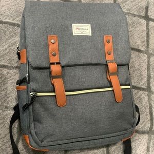 Modoker vintage laptop backpack.